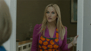 TV gif. Reese Witherspoon as Madeline in Big Little Lies blinks as if caught off guard and nods to a woman who stands in front of her. Text. "Oh."