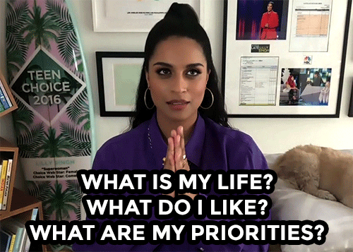 GIF of Lily Singh holds then parts hands while asking: what is my life, what do I like, what are my priorities? 