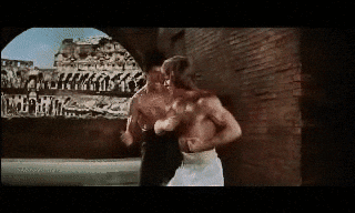 bruce lee thumbs up gif