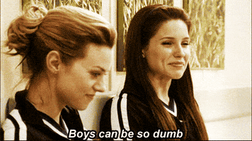 TV gif. Hilarie Burton as Peyton and Sophia Bush as Brooke from One Tree Hill. They sit on the floor and are having a heart to heart as Brooke says, "Boys are so dumb." Peyton nods in agreement and both smile in acknowledgement.