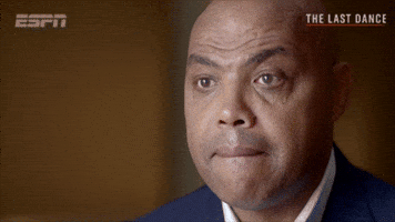 Sports gif. We zoom in for a close-up on a worried-looking Charles Barkley, whose jaw drops slightly as he looks away from us.