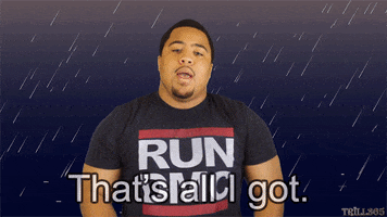 Video gif. Man wearing a RUN DMC shirt stands in animated rain as he shrugs and says, “I’m strugglin’. That’s all I got.”