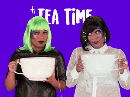 Video gif. Two women hold very large tea cups with both hands. They look at each other with big, wide eyes, and smirks on their faces. They both lift the tea cups to their faces to take sips out of them. Text, “Tea time.”