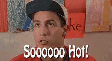 Movie gif. Adam Sandler in Billy Madison looks up, mesmerized by an attractive woman, and says “Soooo hot!”