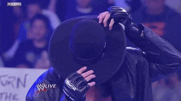 the undertaker reveal GIF by WWE