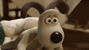Stop motion gif. Gromit from Wallace and Gromit shakes his head, rolls his eyes, and puts his head in his paw. 