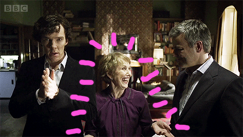 Mrs. Hudson looking at Sherlock and Watson