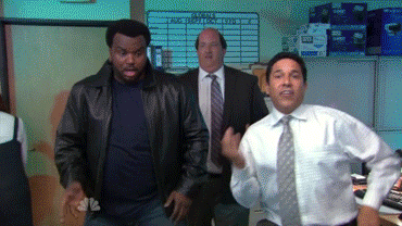 The Office gif. The office is filled with disco lights. Craig Robinson as Darryl, Oscar Nunez as Oscar, and Brian Baumgartner as Kevin show us some serious dance moves.