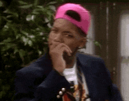 TV gif. Will Smith as Will from The Fresh Prince of Bel-Air, looks at us with his hand over his mouth, looking skeptical or suspicious.. 