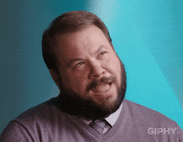 Video gif. Man looks up, thinking really hard, squinting as if that would help him think better. He shakes his head.