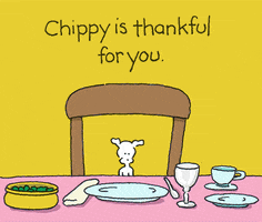 Digital art gif. Tiny white dog sits at a set Thanksgiving table, holding a fork and knife. He holds up a sign that says, “Pass the bones.” Above him reads the message, “Chippy is thankful for you.”
