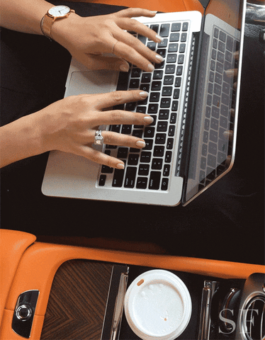 stylymag driving dubai laptop typing GIF