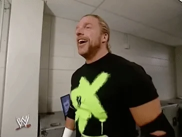 relieved triple h GIF by WWE