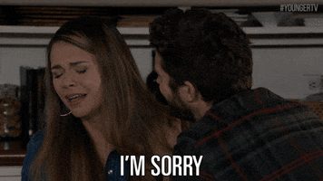 TV gif. Sutton Foster as Liza in Younger winces as she looks up holding back tears. Text, "I'm sorry."