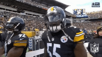 Sports gif. Arthur Moats of the Pittsburgh Steelers in full uniform, nods is helmet enthusiastically at the camera.