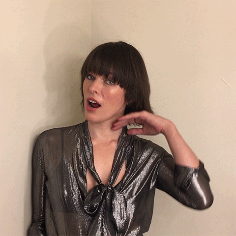 Milla Jovovich Hair Flip Gif By Resident Evil Irl GIF