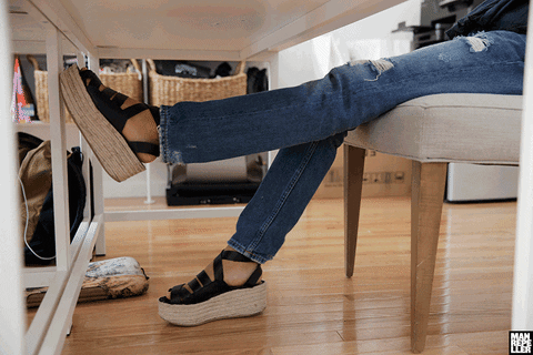 Man Repeller office exercise shoes desk GIF