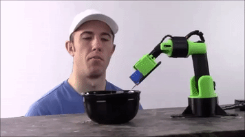 slantconcepts food robot robot cereal robot food eating robot GIF