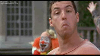 Movie gif. Adam Sandler in Billy Madison stares straight at us and gives a firm nod of the head with a tight smug frown on his face.