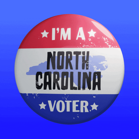 Digital art gif. Round red, white, and blue button featuring the shape of North Carolina spins over a blue background. Text, “I’m a North Carolina voter.”