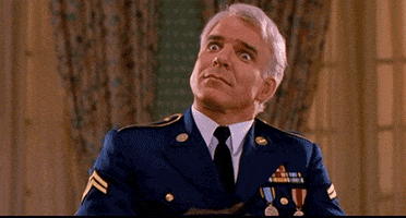 Movie gif. Steve Martin as Freddy in Dirty Rotten Scoundrels holds his fingers to his temples as if he is trying to see something psychically. Then he shakes his head as if to say, “I got nothing.”