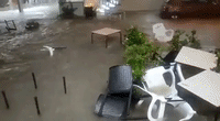 Restaurant Tables and Chairs Swept Away by Floodwater Amid Costa Blanca Deluge