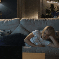 Couch Laying GIF by Neighbours (Official TV Show account)