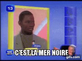 TV gif. A French game show contestant hesitantly answers "C'est la mer noire."
