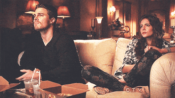 bored oliver queen GIF