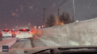'Insane': Motorists Drive by Towering Snowbanks in Buffalo