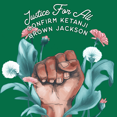 Illustrated gif. Fist rises up between the fronds of pink and white flowers that wave against a forest green background. Text, "Justice for all. Confirm Ketanji Brown Jackson."