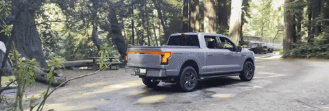 Ford F-150 Lightning Towing a 19’ Escape Trailer and using Pro Power campin.JPG