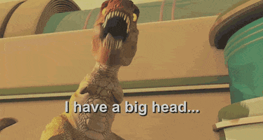 TV gif. The T-Rex in Meet The Robinsons, looks down with his large dinosaur head. He holds his short front arms away from his body and waves them. Text reads, "I have a big head... and little arms."