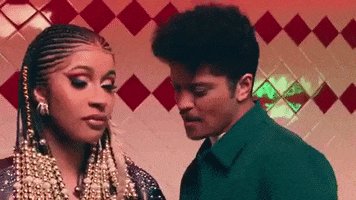 Bruno Mars Flirting GIF by Cardi B