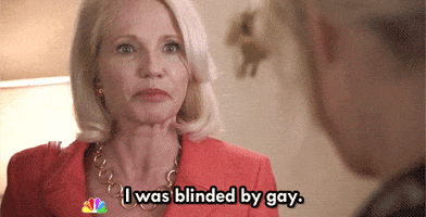 TV gif. Ellen Barkin as Jane in The New Normal, says defensively "I was blinded by gay!"