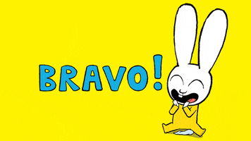 Cartoon gif. Simon Super Rabbit is wearing a onesie and smiles with his eyes closed. He claps and says, "Bravo!"
