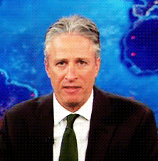 TV gif. Jon Stewart on The Daily Show looks at us over exaggeratingly tilting his head side to side with a confused, almost concerned  look on his face.