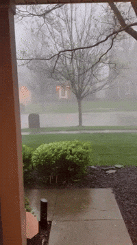 Rain Pelts Lexington Neighborhood as Tornado Watch Issued in Central Kentucky