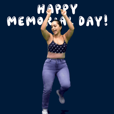 Digital art gif. Woman wearing an American flag tank top gets low and dances happily in front of little animations of fireworks and white bubble text that says "Happy Memorial Day!" all against a dark blue background.