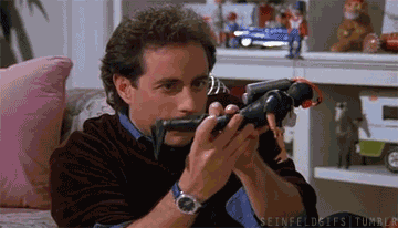 Image result for seinfeld playing with toys gif