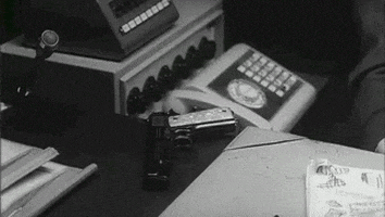 peter sellers gun GIF