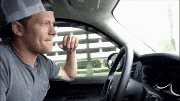 country music fist pump GIF