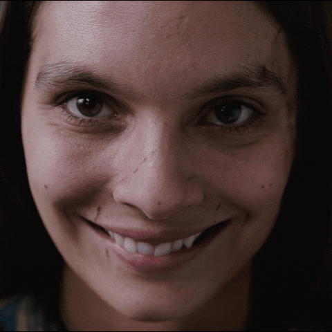 Caitlin Stasey Creepy Smile GIF by Smile Movie - Find & Share on GIPHY