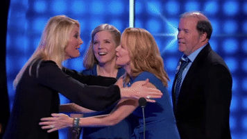 celebrity family feud hug GIF by ABC Network