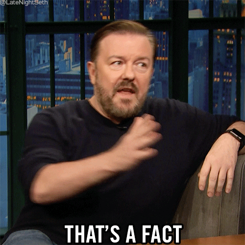 Celebrity gif. Ricky Gervais on Late Night with Seth Meyers, comfortable on the couch, gestures a flat hand to the desk saying, "That's a fact."