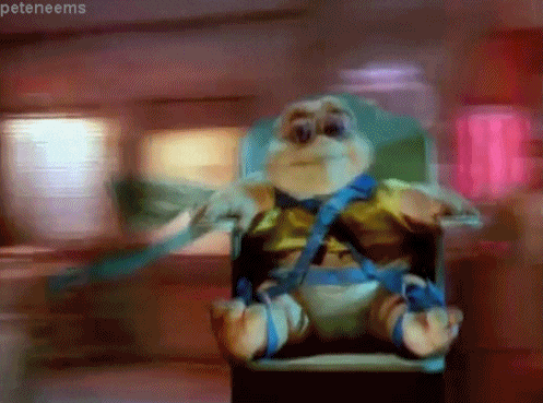 baby sinclair spinning GIF - baby sinclair spinning GIF