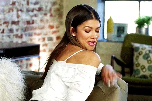 confident dust your shoulders off GIF