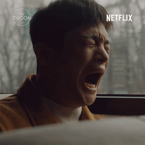 TV gif. Seo In Guk as Han-Joon in the Korean drama, Café Minamdang. He is sobbing openly on a train, his entire face warped with pain, and his mouth hangs open. He is clearly in agony as he puts a hand to the window, trying to stabilize himself.