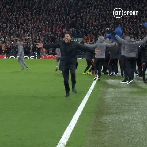 GIF showing Atlético Madrid coach Diego Simeone celebrating enthusiastically, expressing his passion for the team and achievements.