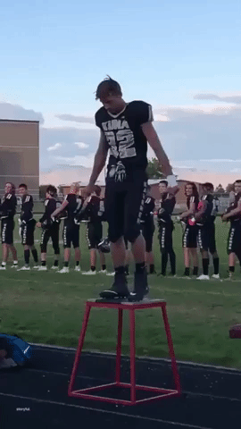 High School Football Player Signs National Anthem at Homecoming Game